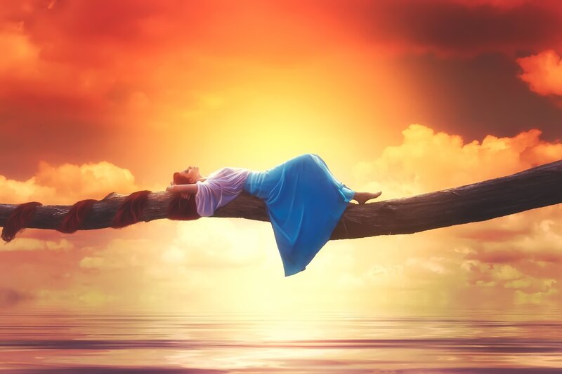 Woman Lying on Branch