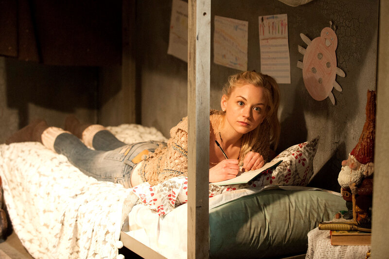 Woman Lying on Bunk Bed