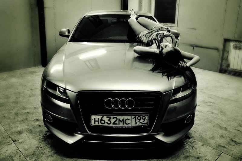 woman lying on car hood