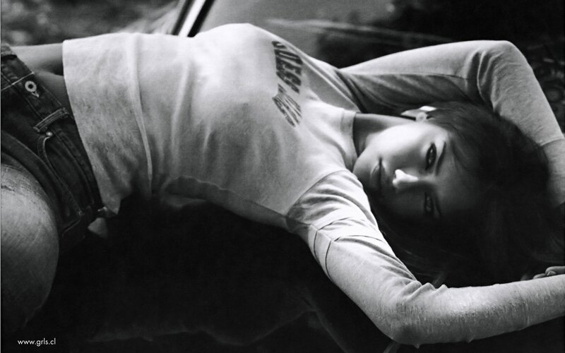 woman lying on car hood