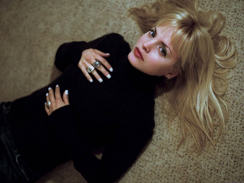 woman lying on carpet