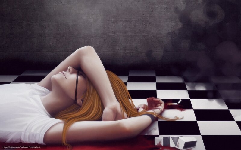 Woman lying on checkered floor
