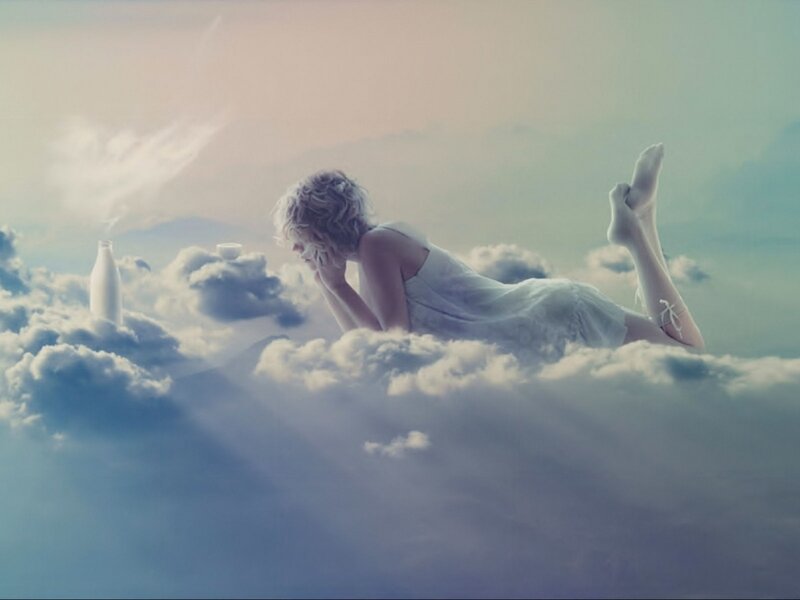 Woman Lying on Clouds — White, Serene