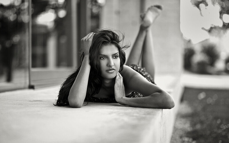 Woman Lying on Concrete — Black