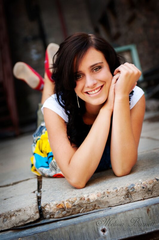 woman lying on concrete steps