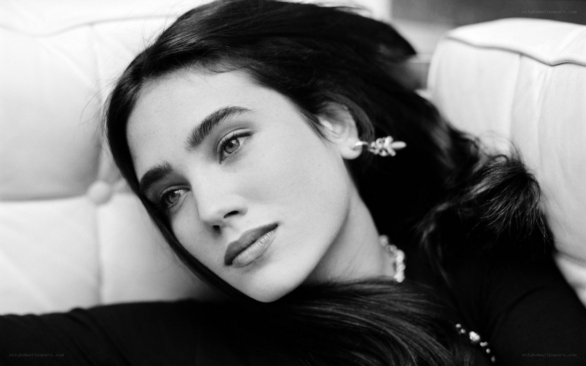 woman lying on couch