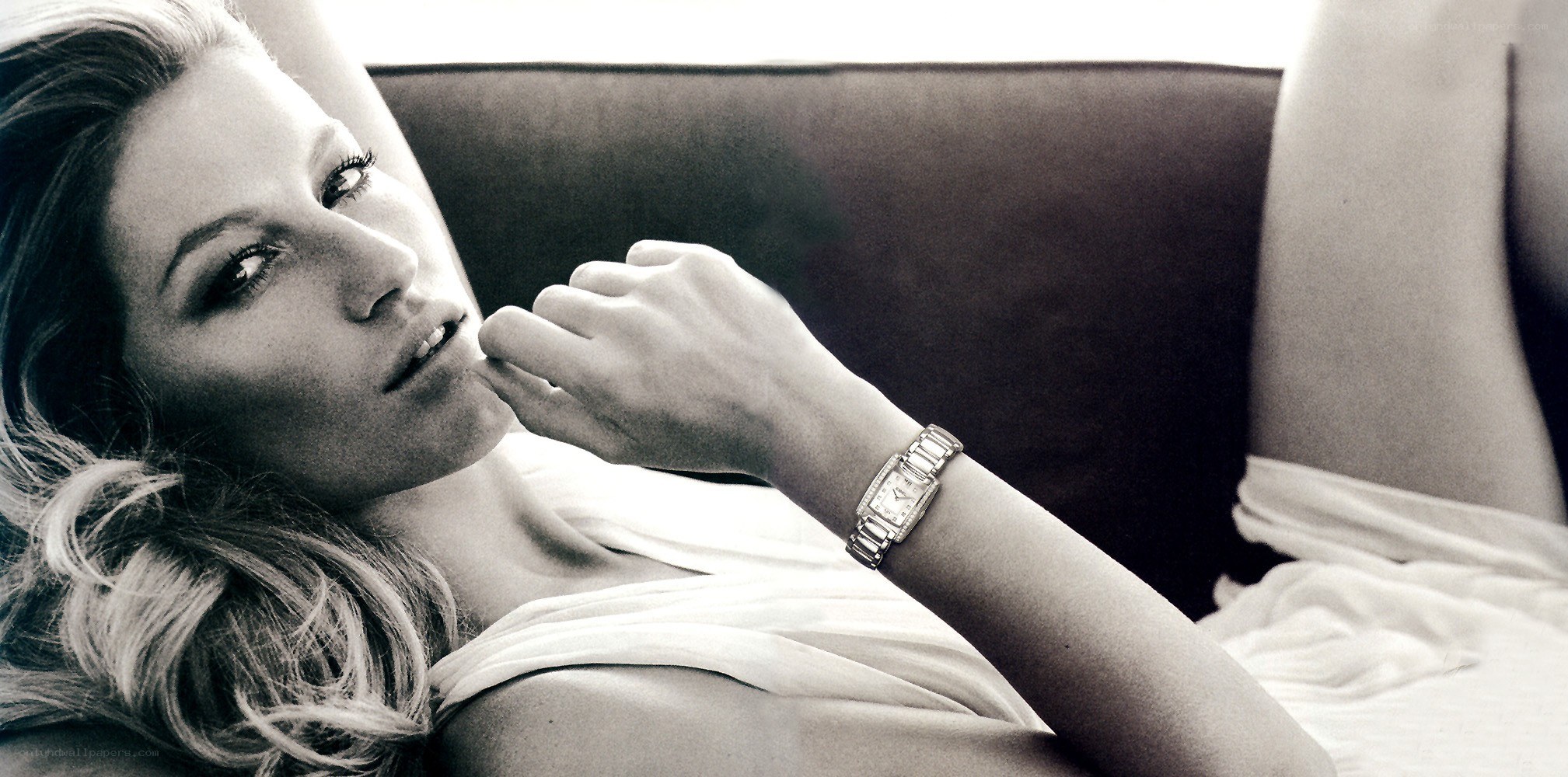 woman lying on couch