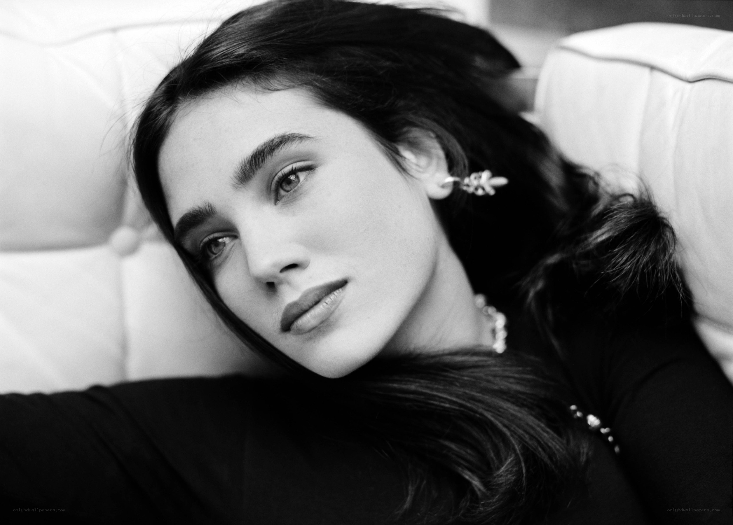 woman lying on couch