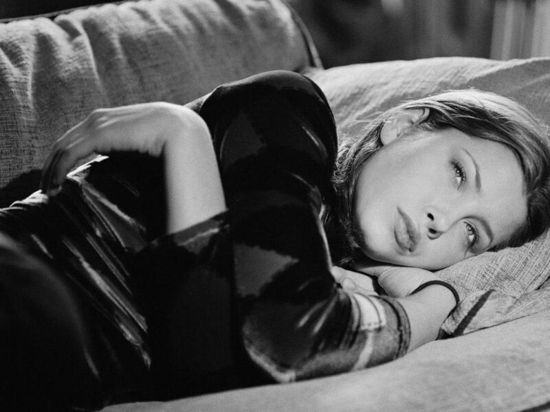 Woman Lying on Couch — Black
