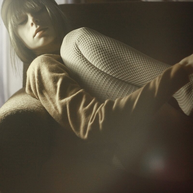 Woman Lying on Couch — Brown, Calm, Photograph, Leg Warmers