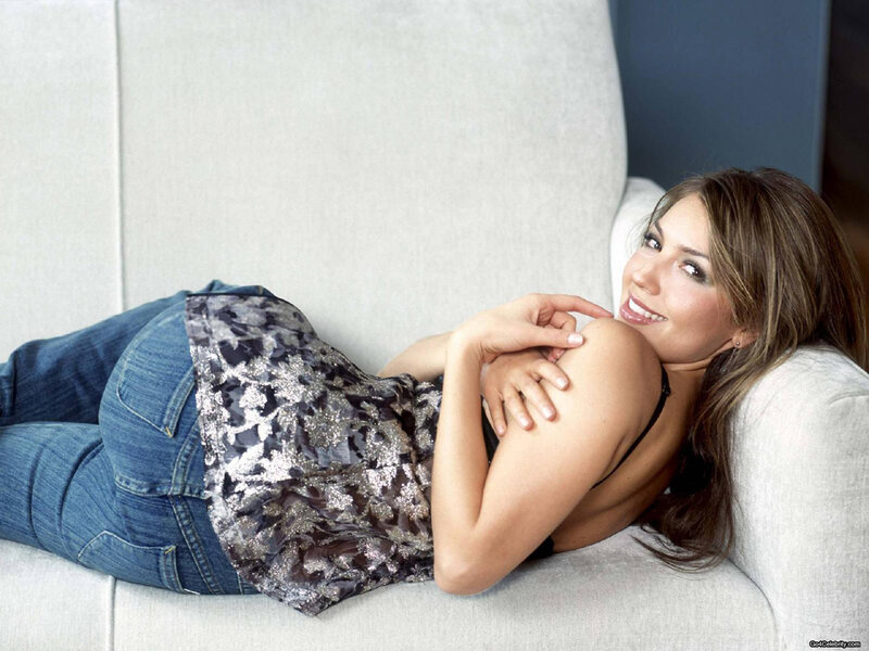 Woman Lying on Couch — Gray, Relaxed, Photograph, Jeans, Top