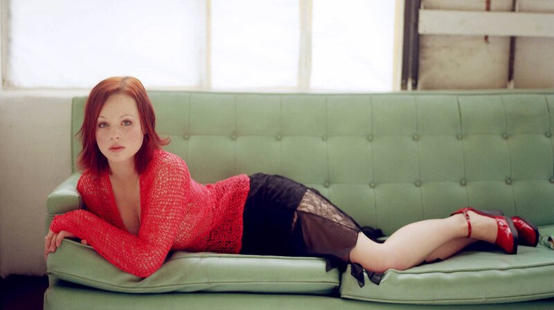 Woman Lying on Couch — Green, Relaxed, Afternoon