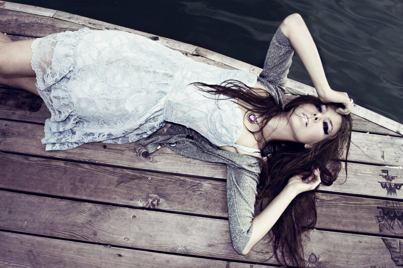 Woman Lying on Dock — White