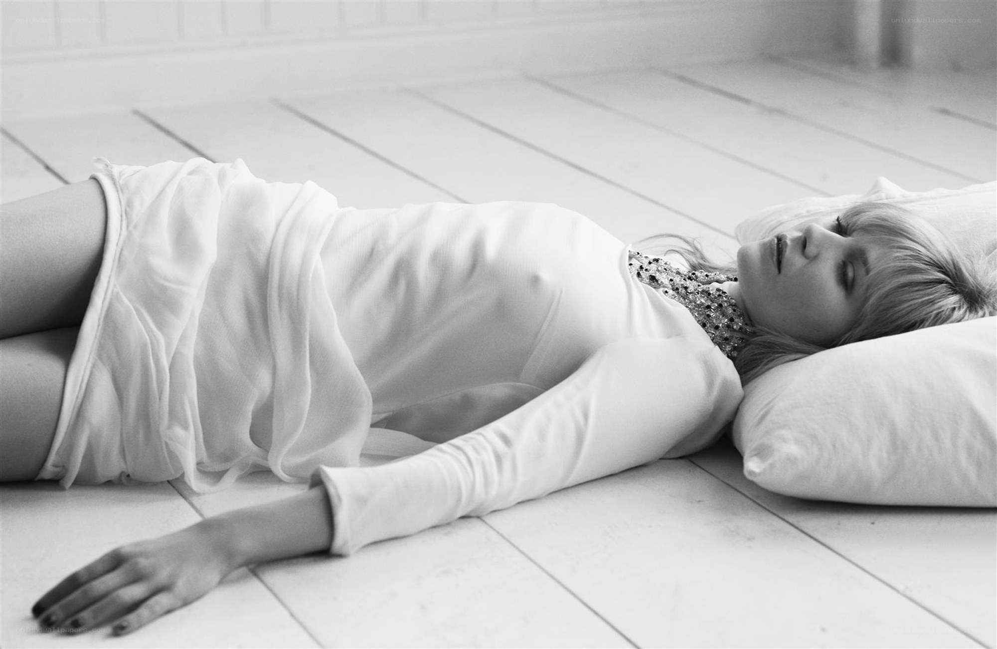 woman lying on floor