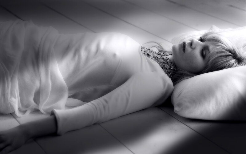 woman lying on floor