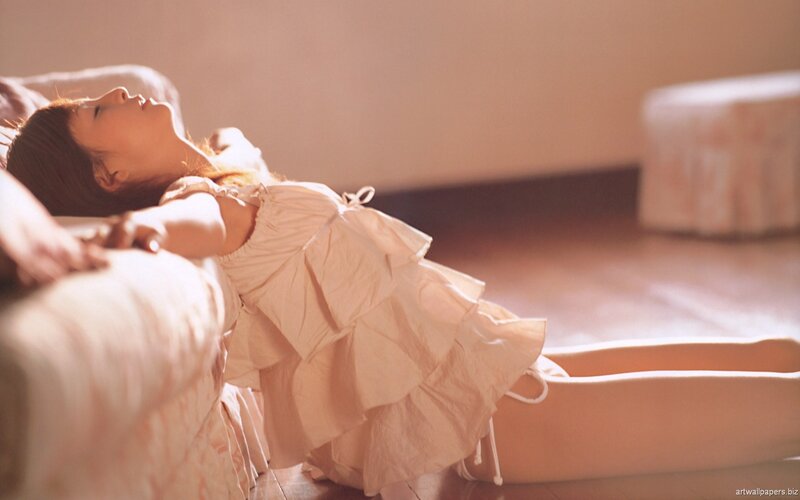 Woman Lying on Floor — Beige