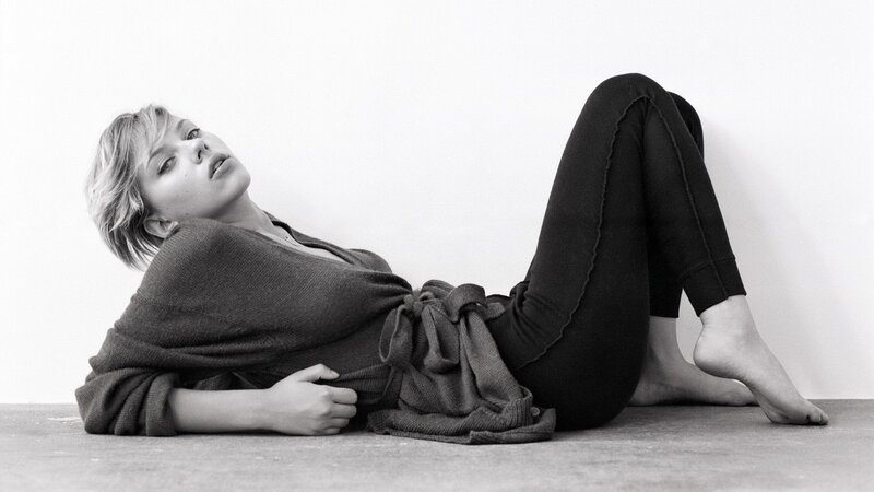 Woman Lying on Floor — Black, Calm, Photograph, Sweater, Pants, White