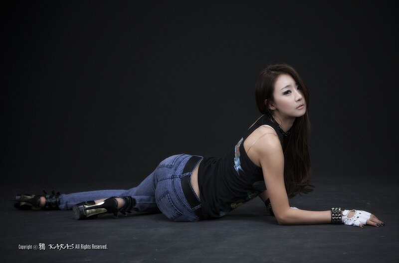 Woman Lying on Floor — Black, Dramatic, Photograph, Jeans, Gloves