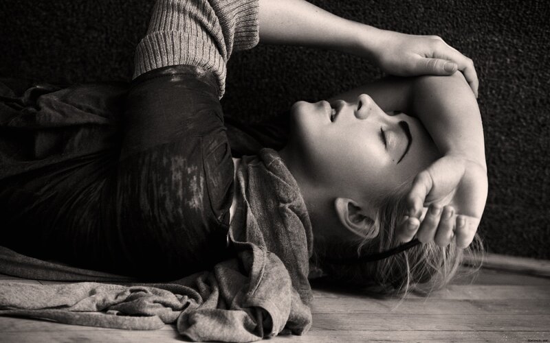 Woman Lying on Floor — Black, Dramatic, Photograph, Sweater, Hair, White