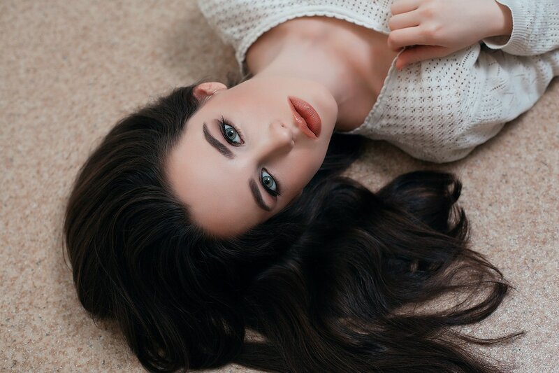 Woman Lying on Floor — Brown, Calm, Photograph, Carpet