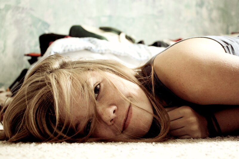 Woman Lying on Floor — Brown, Calm, Photograph, Carpet, Wall