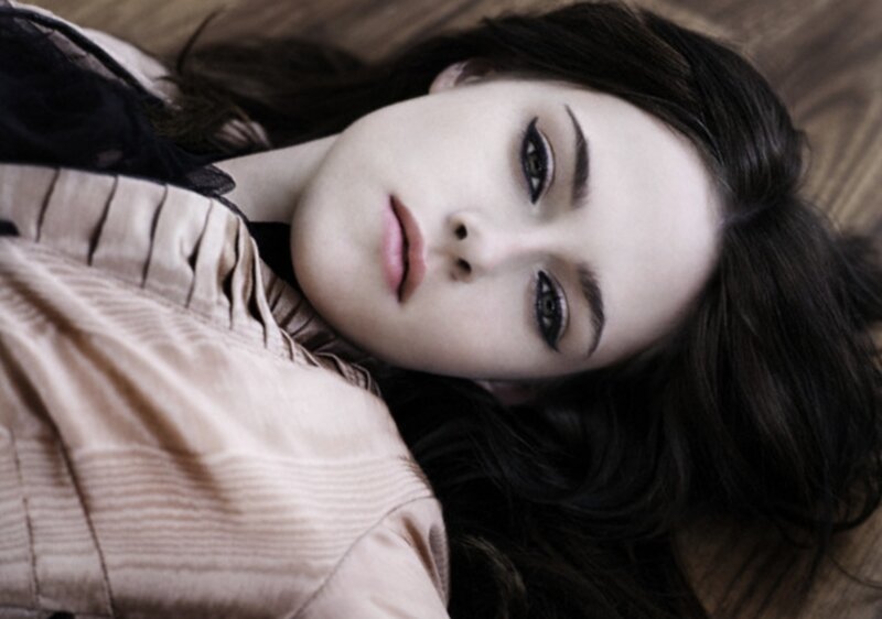 Woman Lying on Floor — Brown, Dramatic, Photograph, Wood Floor