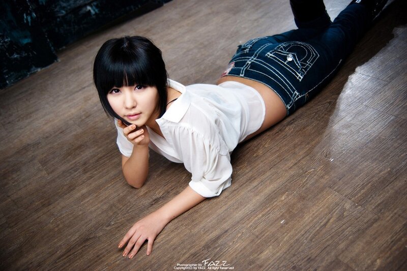 Woman Lying on Floor — Brown, Neutral, Photograph, White Shirt
