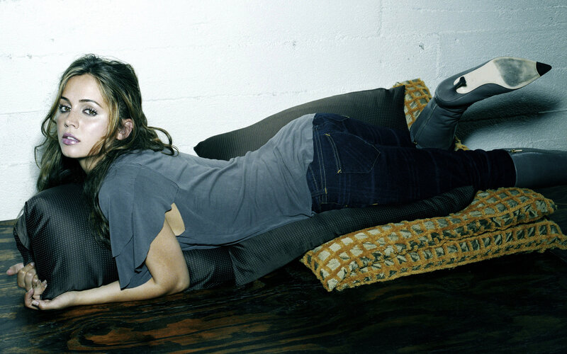 Woman Lying on Floor — Gray, Relaxed, Photograph, Pillows, Boots, Wall