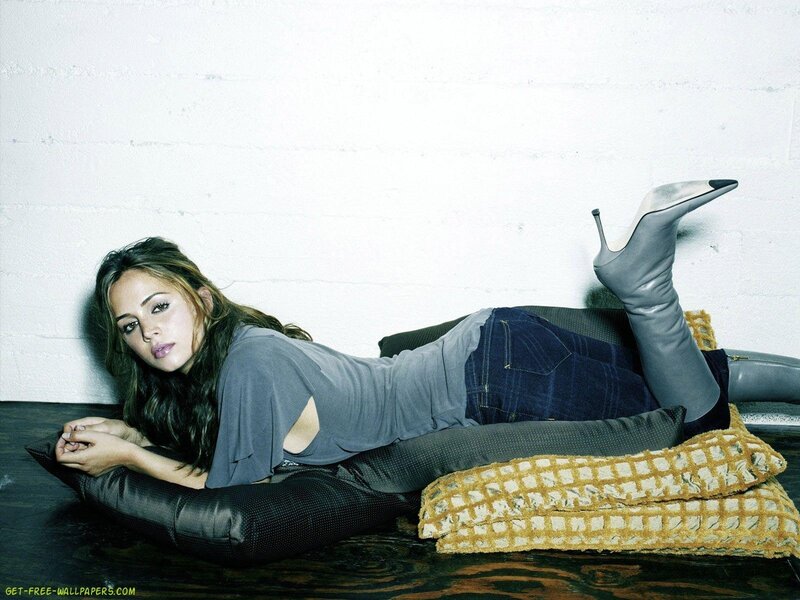 woman lying on floor in jeans