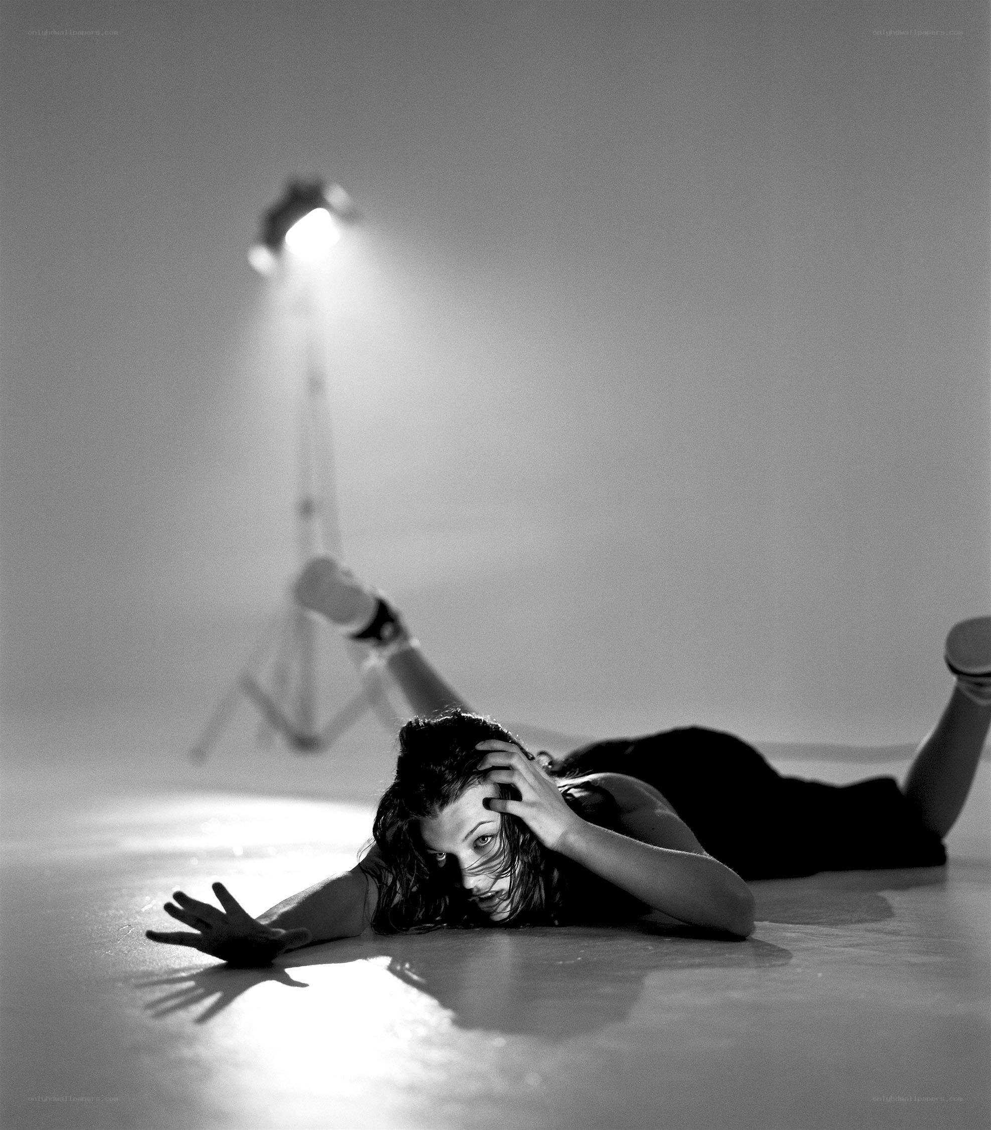 woman lying on floor in studio