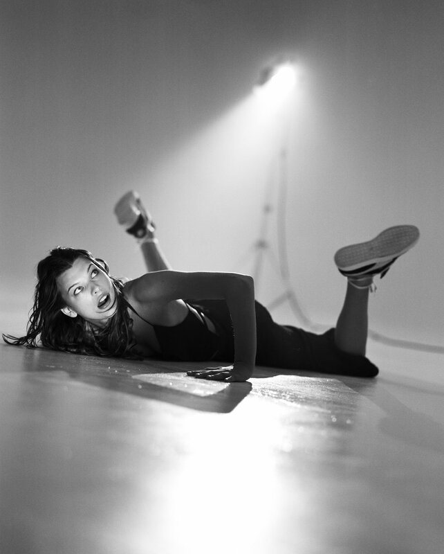woman lying on floor in studio