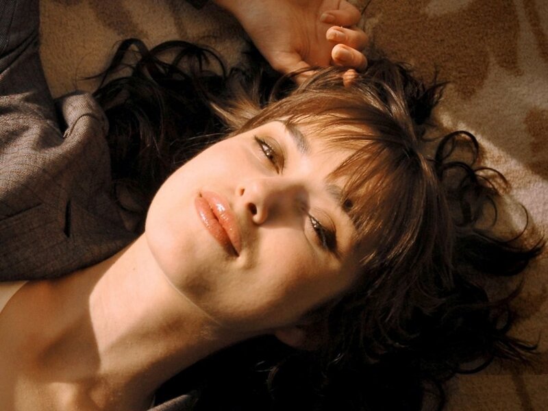 woman lying on floor in sunlight