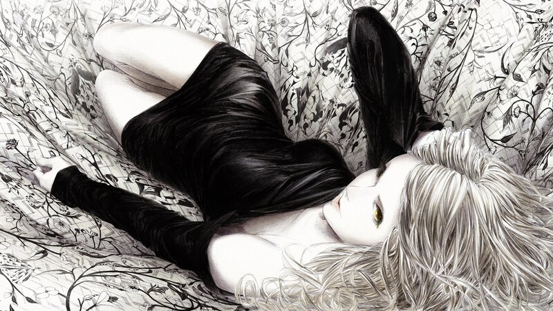 woman lying on floral bed