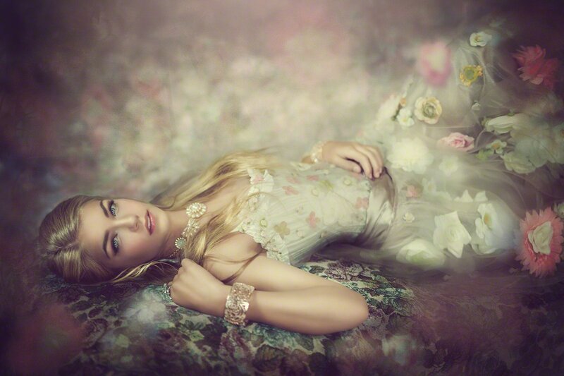 Woman Lying on Floral Surface