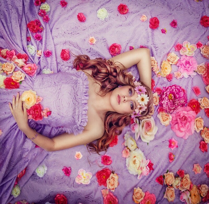 Woman Lying on Flowers — Purple, Serene