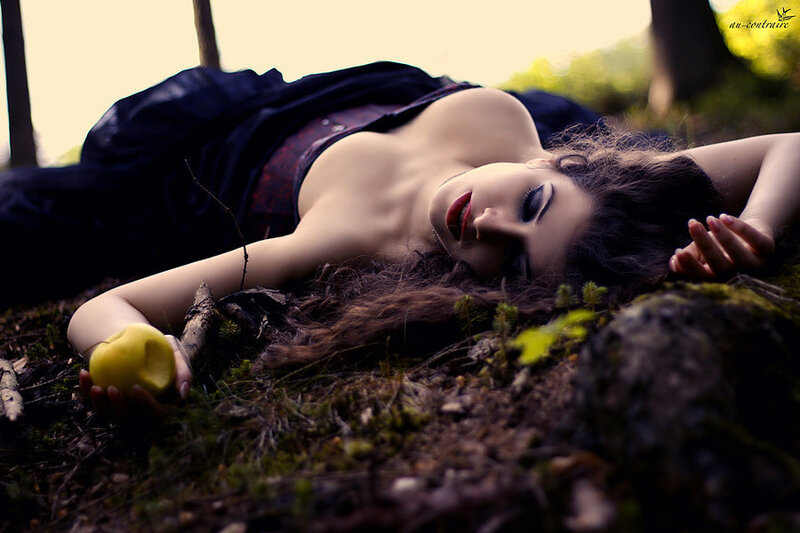 Woman Lying on Forest Floor — Brown, Dramatic