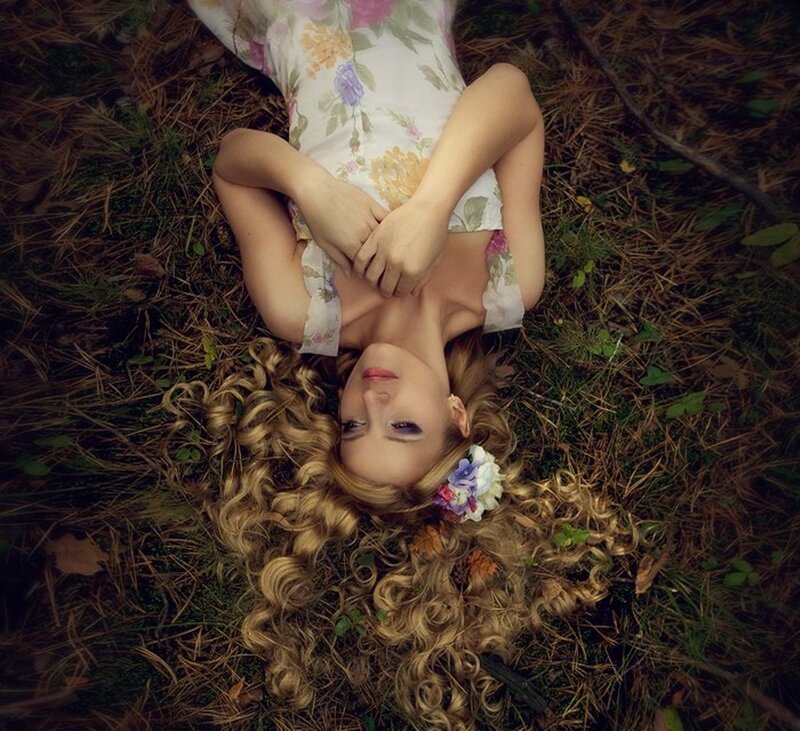 Woman Lying on Forest Floor — Brown, Serene