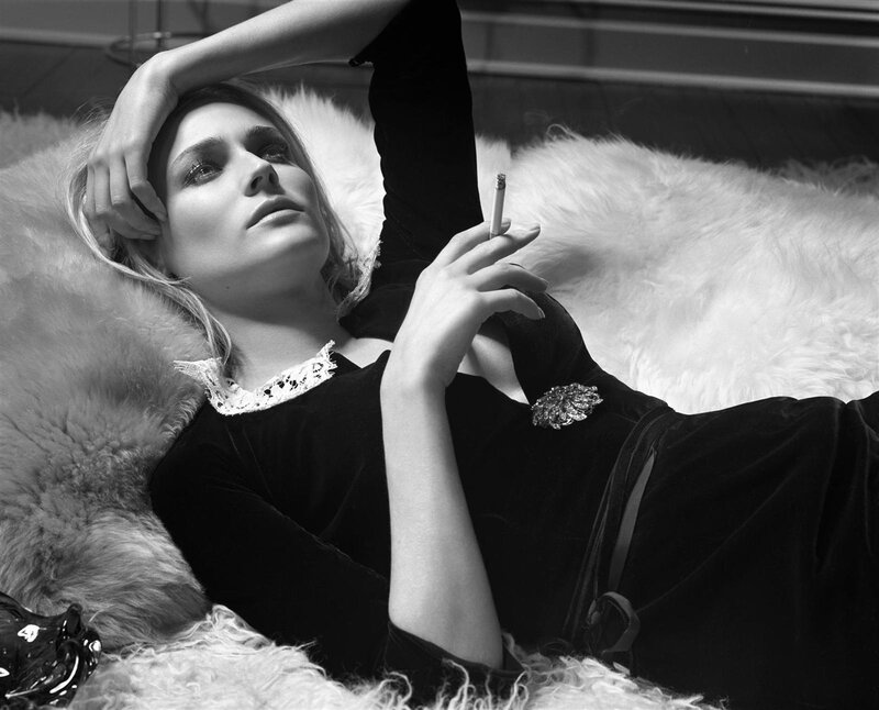 Woman Lying on Fur — Black, Dramatic, Photograph, Cigarette