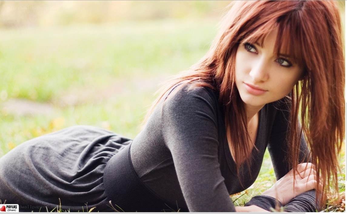 woman lying on grass