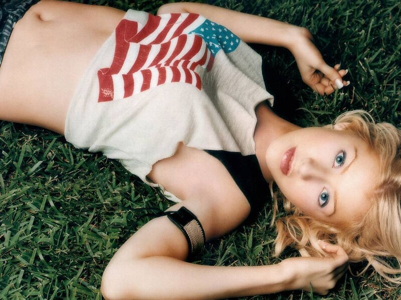 woman lying on grass