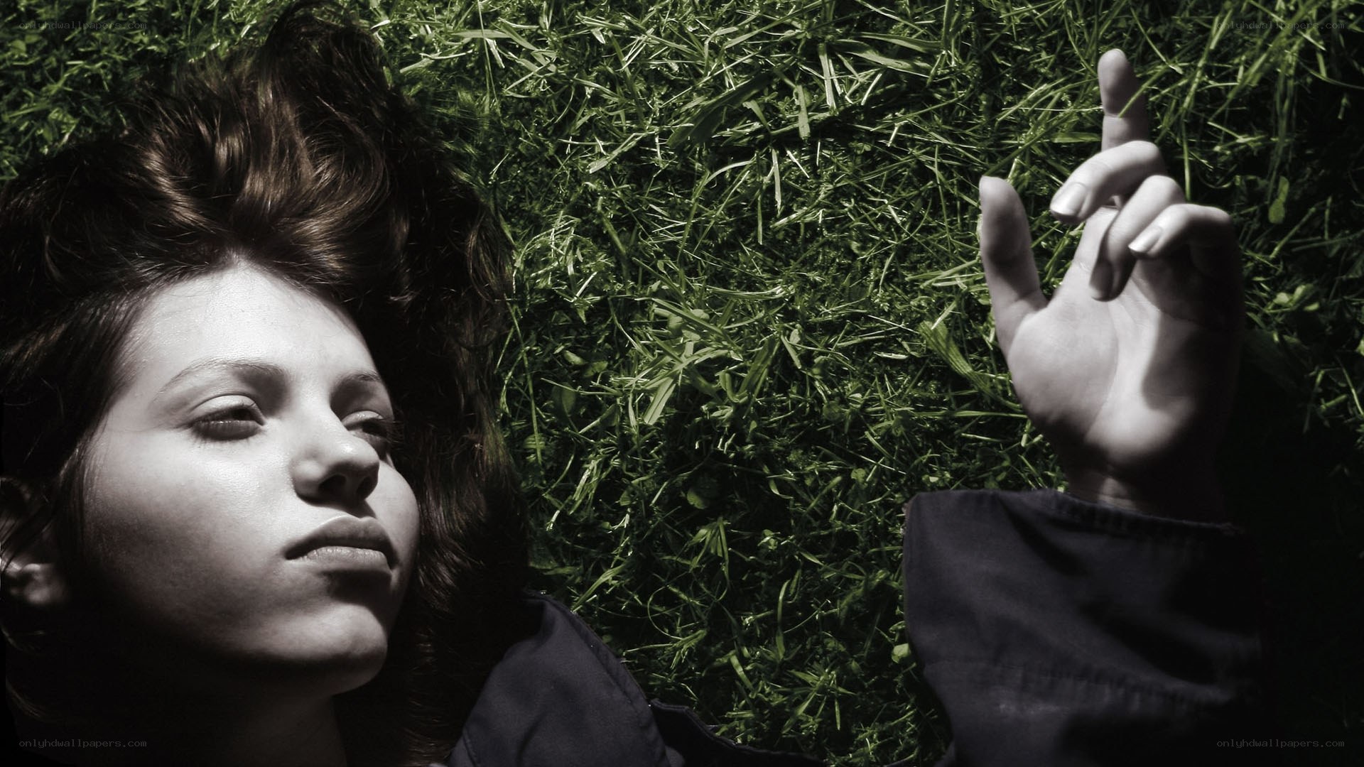 woman lying on grass