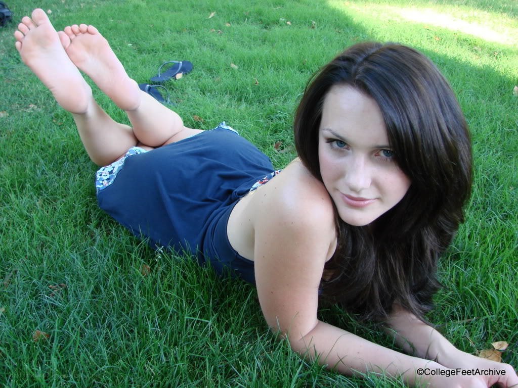 woman lying on grass