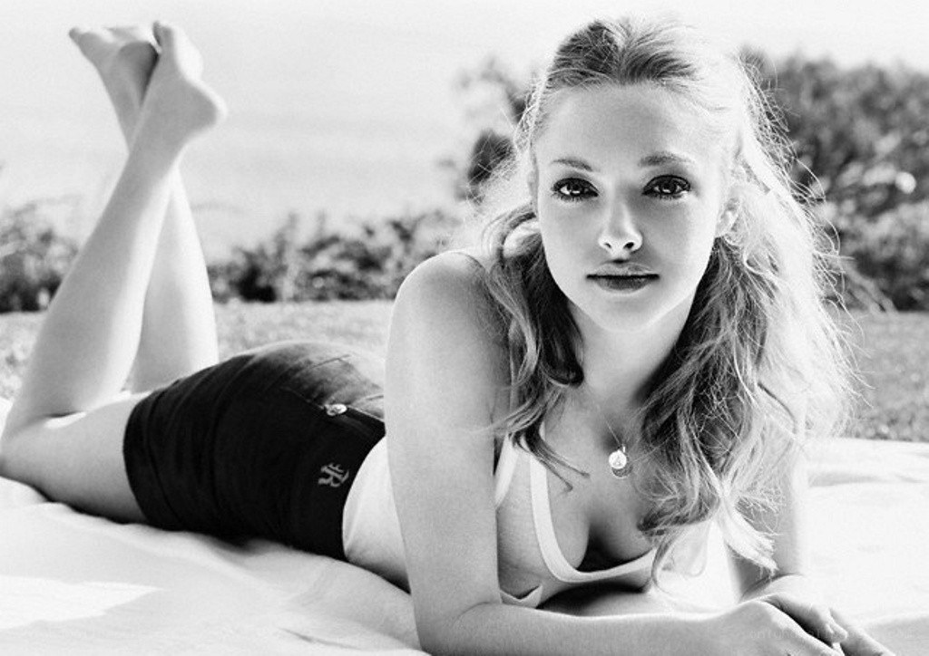 woman lying on grass