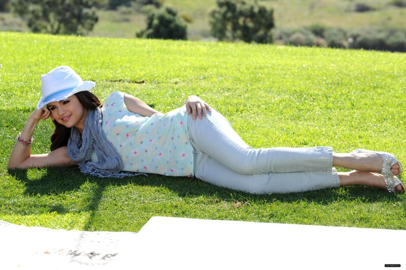 woman lying on grass