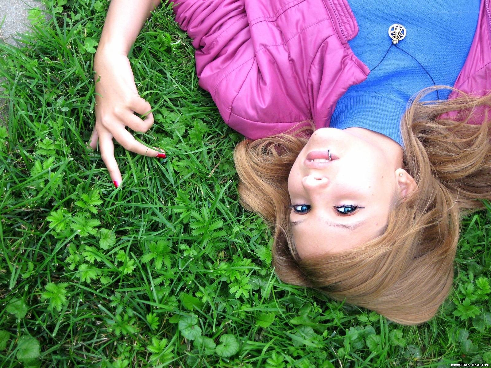 woman lying on grass