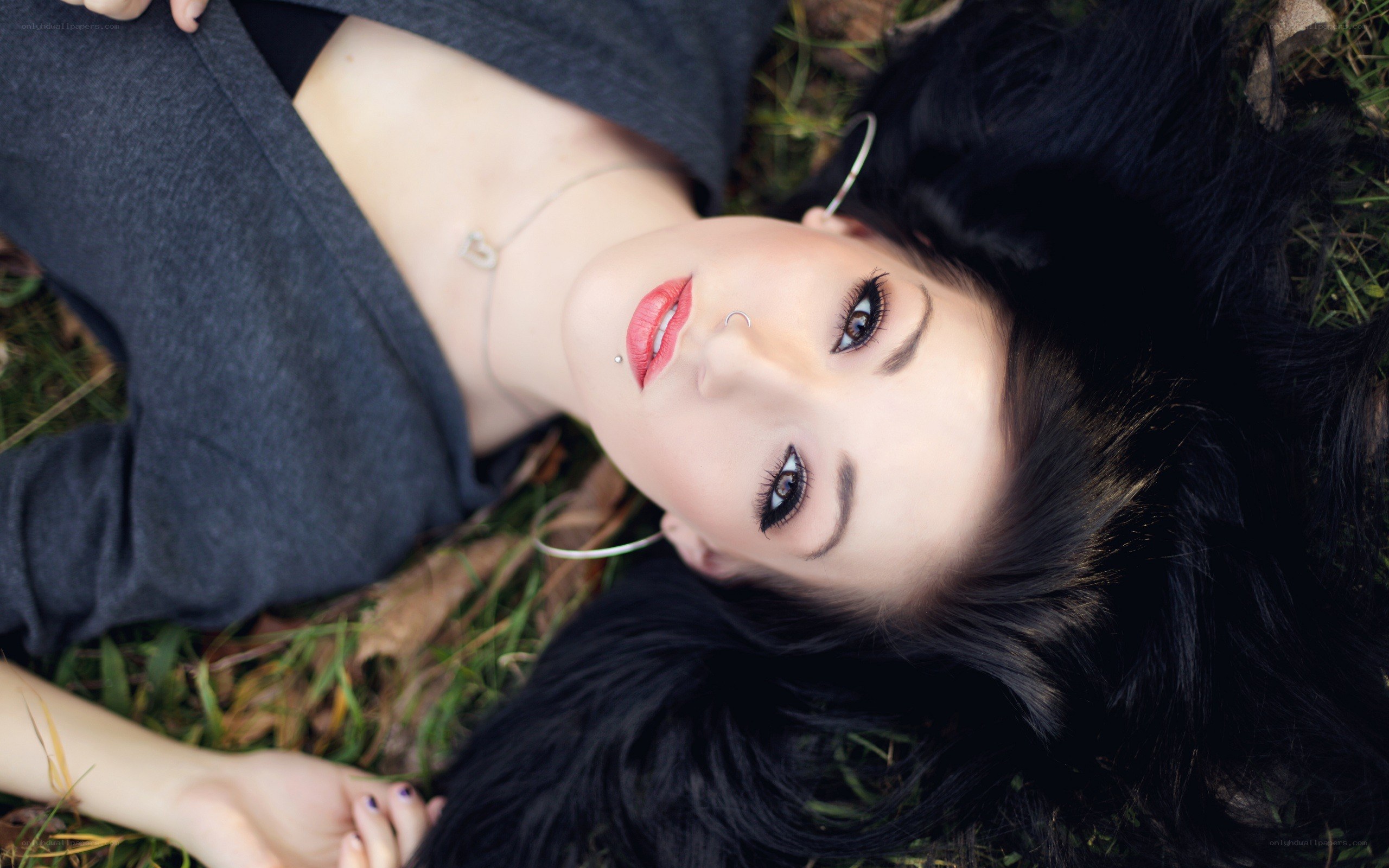 woman lying on grass