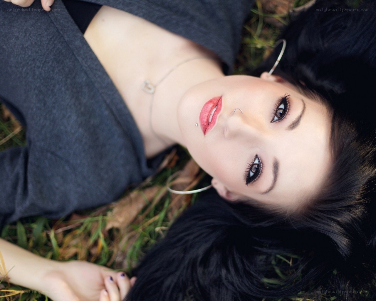 woman lying on grass