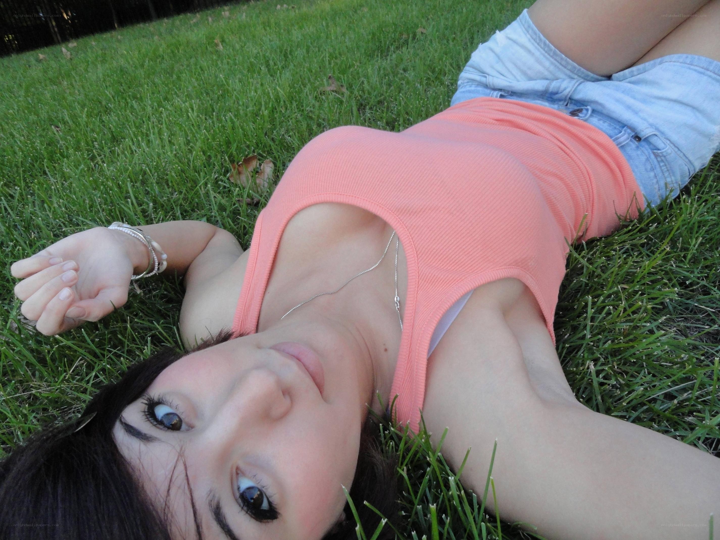 woman lying on grass