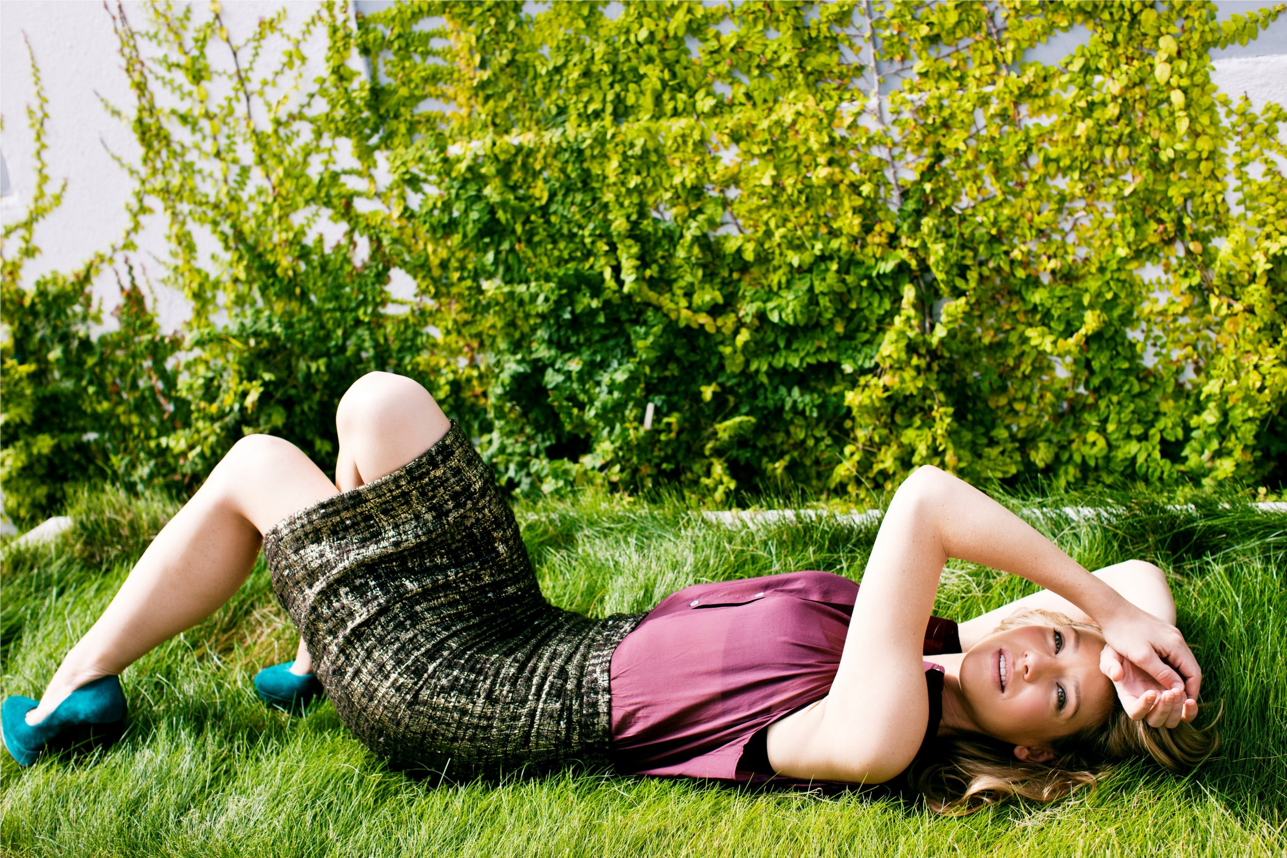 woman lying on grass