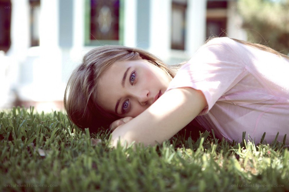 woman lying on grass